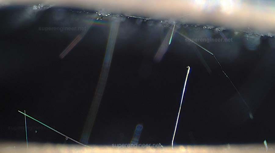 Tin whiskers - optical microscopy image